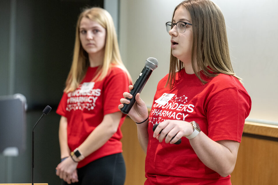 The Wonders of Pharmacy_032024_PLNZ9_5641 PharmD student Ellie Maday talks to the audience as they explain the Dance is Medicine CRoME lab activity during the Wonders of Pharmacy activities on Saturday, March 2, 2024, at the School of Pharmacy on the campus of UW-Madison. (Photo Paul L. Newby, II)