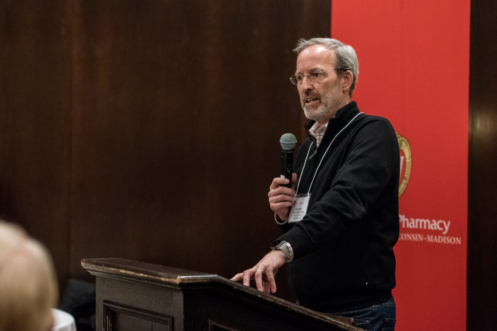 UW-Pharm-Maggianos_20220426_DSC_8588_059 Dave Mott speaking at the podium