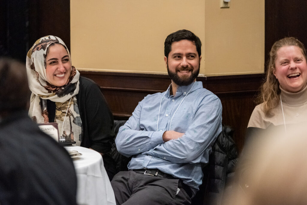 UW-Pharm-Maggianos_20220426_DSC_8624_069 Event attendees smiling