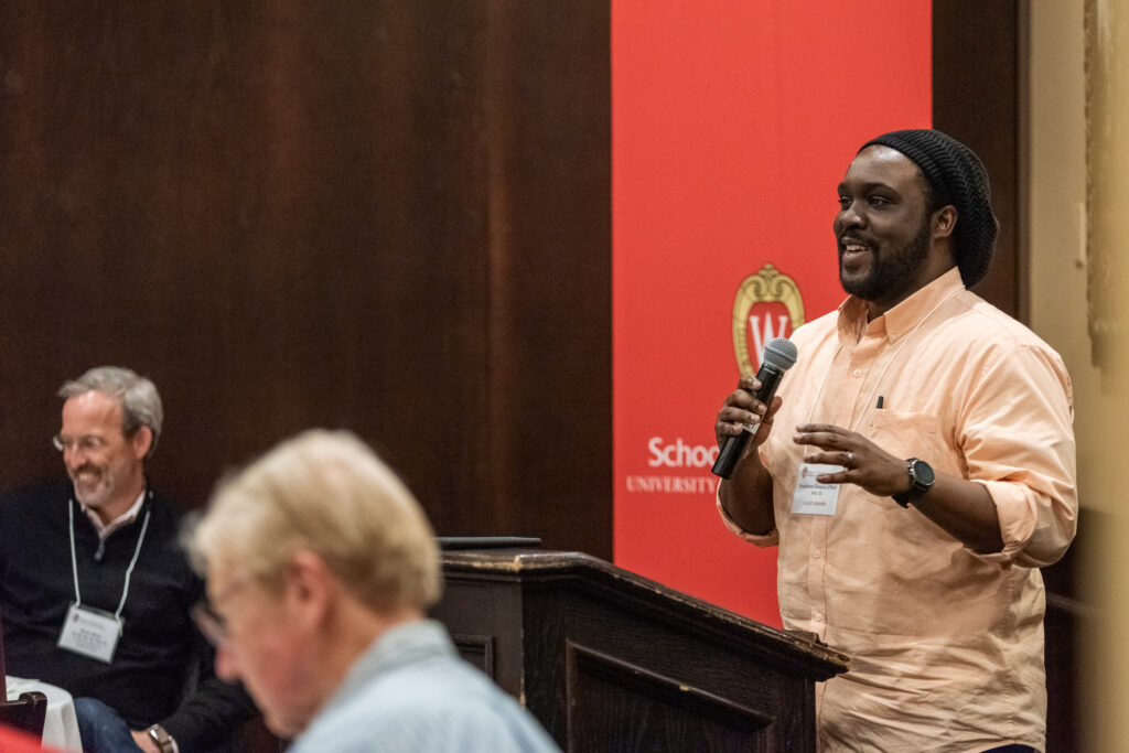 UW-Pharm-Maggianos_20220426_DSC_8713_076 Alum Kwadwo Owusu-Ofori (PhD '10) speaking at podium