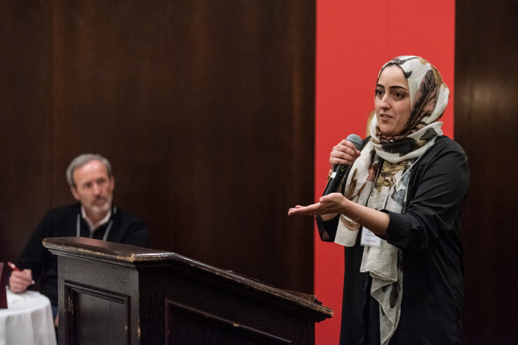 UW-Pharm-Maggianos_20220426_DSC_8933_111 Dalia Saleh speaking at the podium