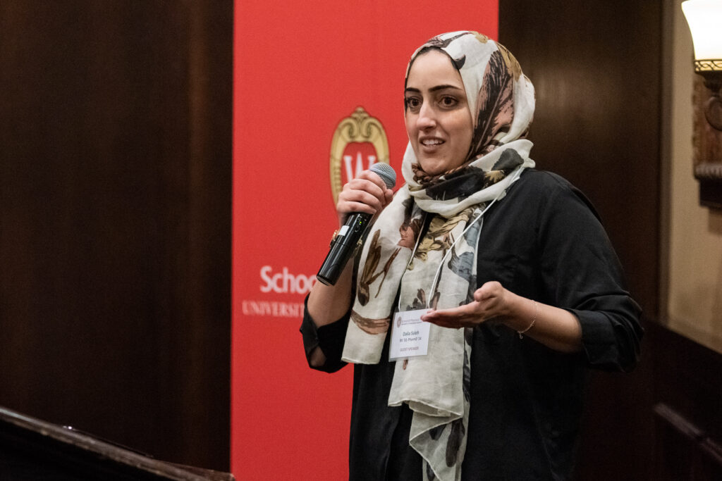 UW-Pharm-Maggianos_20220426_DSC_8936_112 Dalia Saleh speaking at the podium