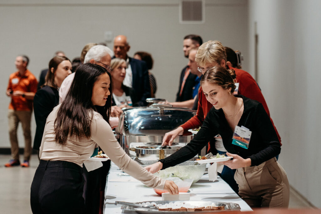 UWL-PAA-22 Alumni getting food from the buffet.