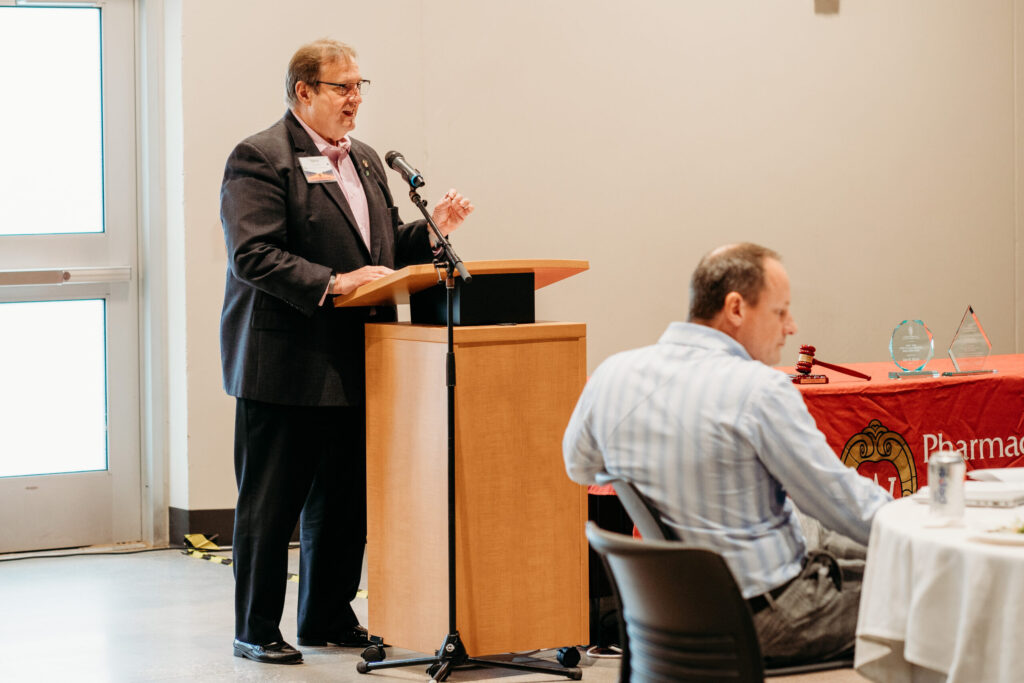 UWL-PAA-29 Dean Steve Swanson speaks at the podium.