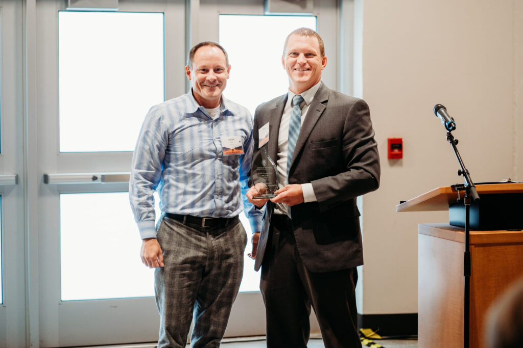 UWL-PAA-49 Jason Lau and Matt McGowan pose with Matt's award.