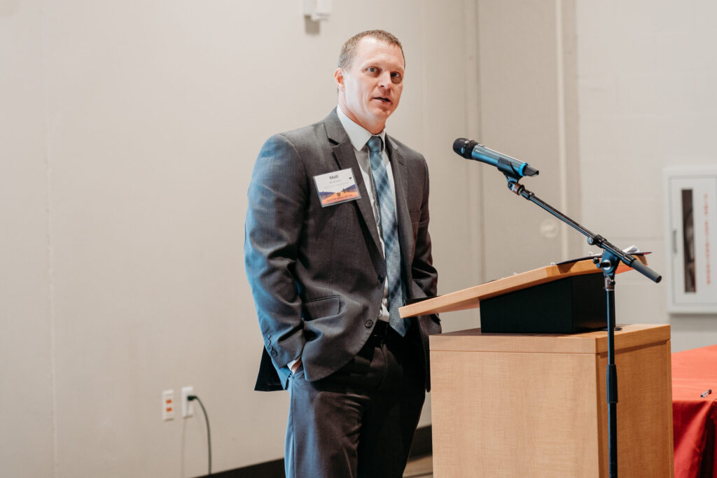 UWL-PAA-50 Matt McGowan speaks at the podium.
