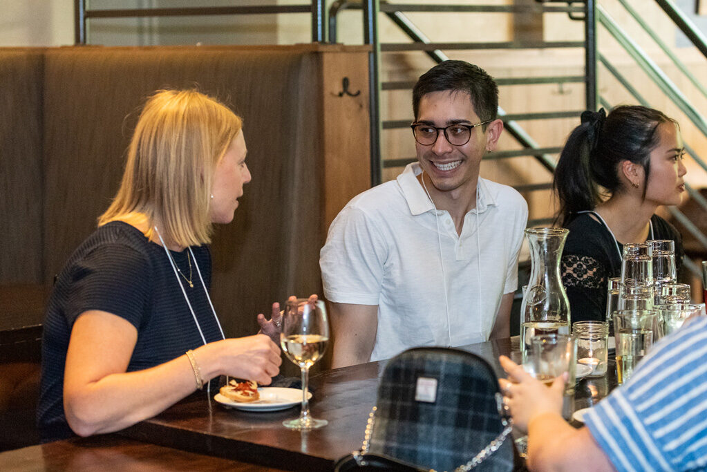 UWPharm-Coopers_2022_DSC_1449_022 Ly Hoang (PharmTox alum 2019) chats with Sara King