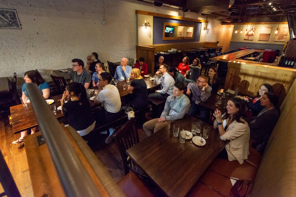 UWPharm-Coopers_2022__DSC4138_104 SoP alumni listen to Dave Mott's presentation at Cooper's Tavern