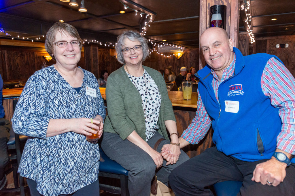 Renee Brenengen with Jeanne and Jeff Holmquist at bar