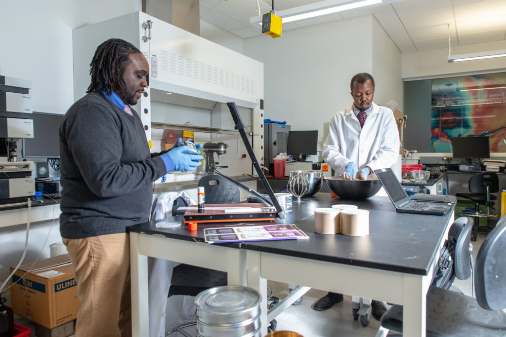 UWPharm-Satori-11262018-039 Kwadwo Owusu-Ofori and Walter Matthews creating their product in the lab