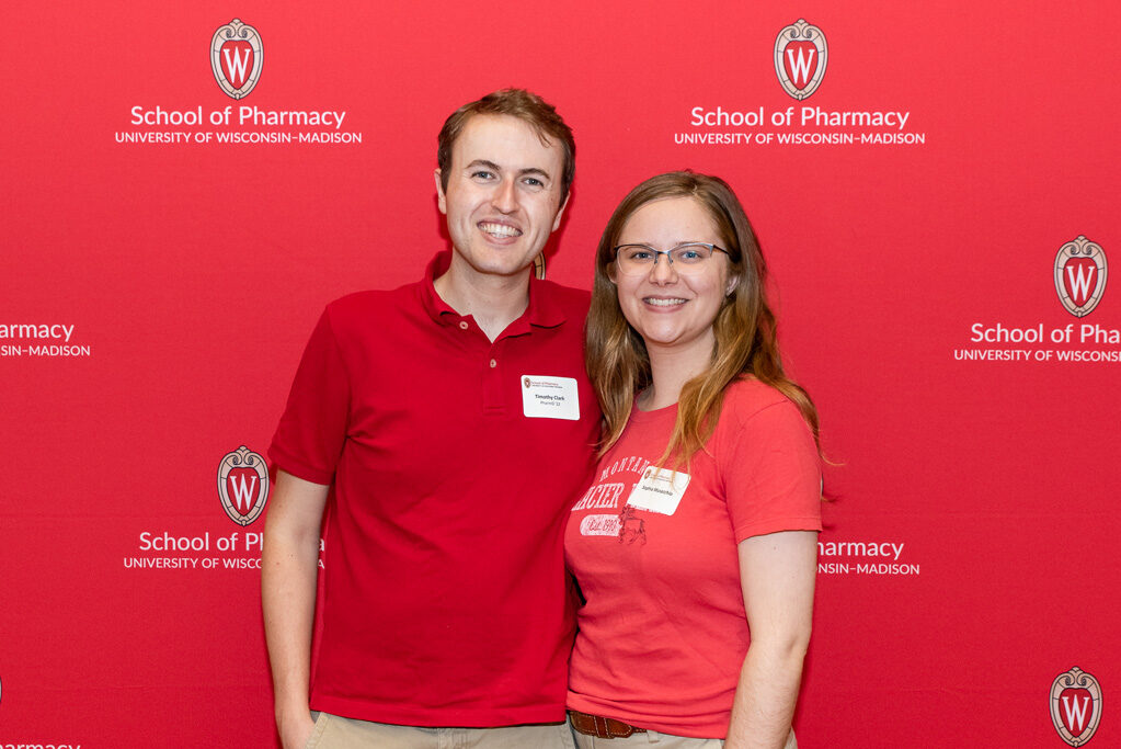 UWPharm-Tailgate_09172022_027 Timothy Clark and Sophia Musacchio smile for a photo.