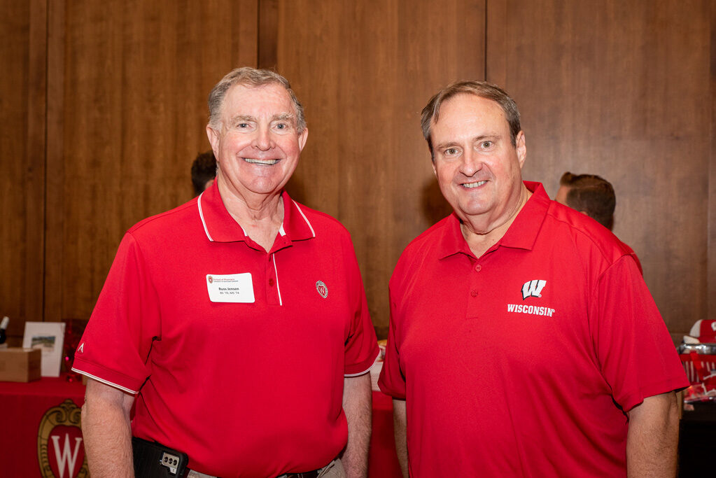 UWPharm-Tailgate_09172022_055 Dean Steve Swanson and Russ Jensen pose with smiles.