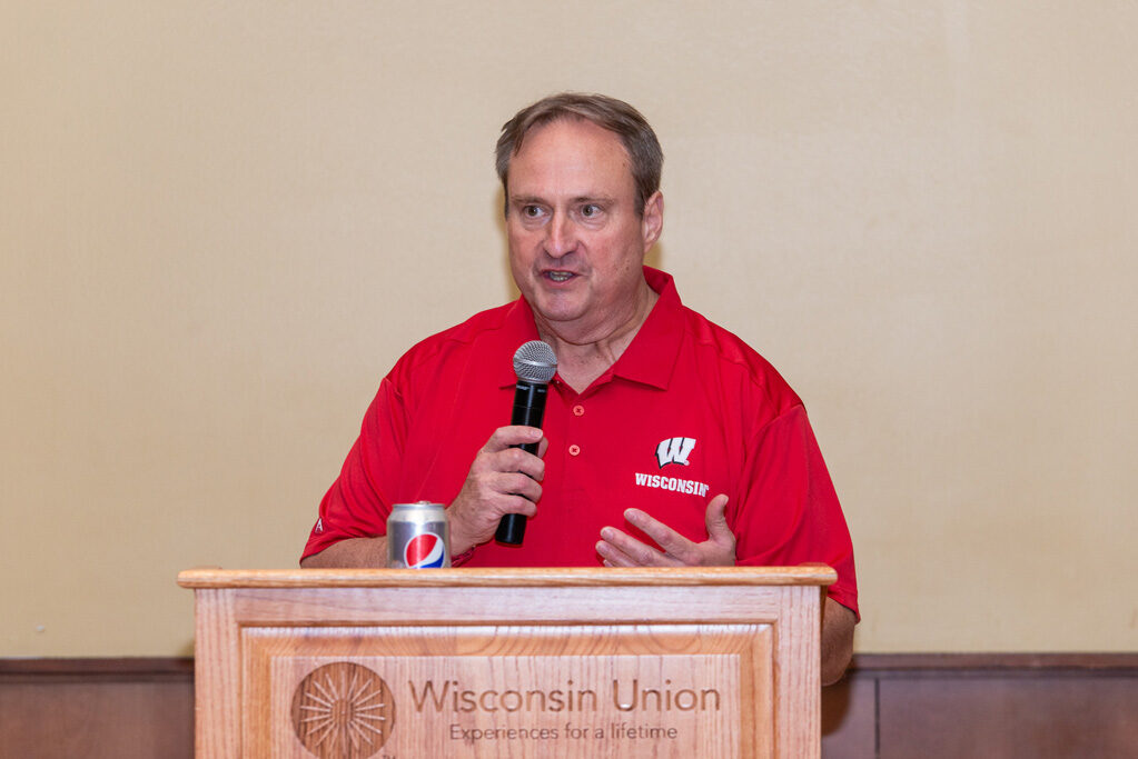 UWPharm-Tailgate_09172022_056 School of Pharmacy Dean Steve Swanson speaks at the podium.