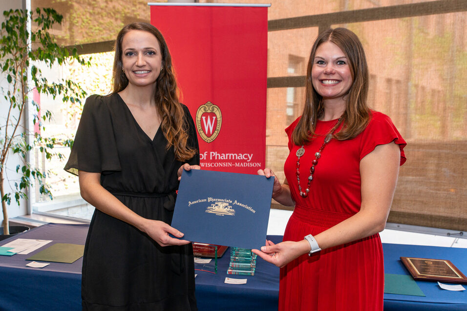 UWPhrmAward_2022_037 UW Pharm Award recipient holding their award