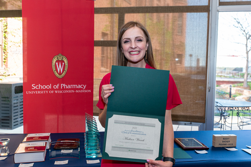 UWPhrmAward_2022_044 UW Pharm Award recipient holding their award