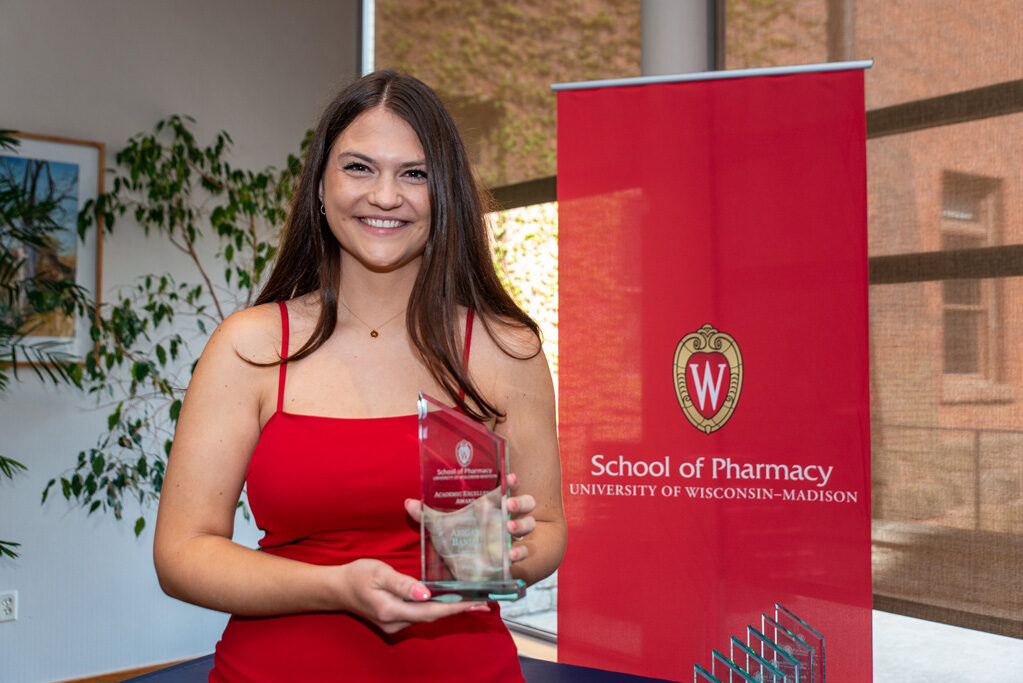 UWPhrmAward_2022_063 UW Pharm Award recipient holding their award