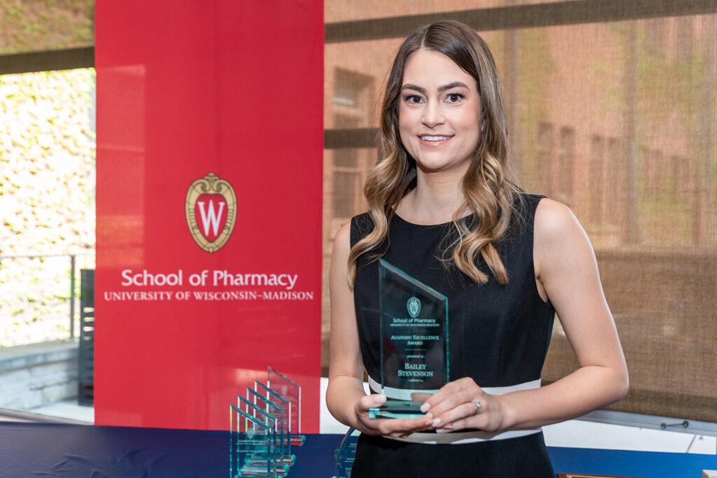UWPhrmAward_2022_065 UW Pharm Award recipient holding their award