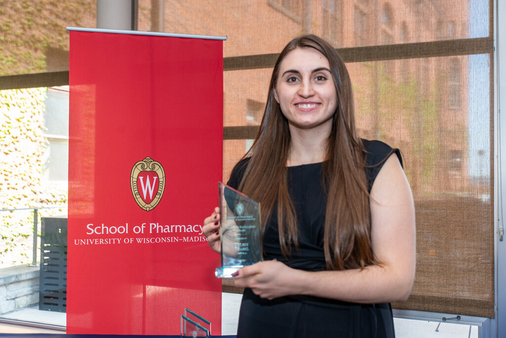 UWPhrmAward_2022_071 UW Pharm Award recipient holding their award