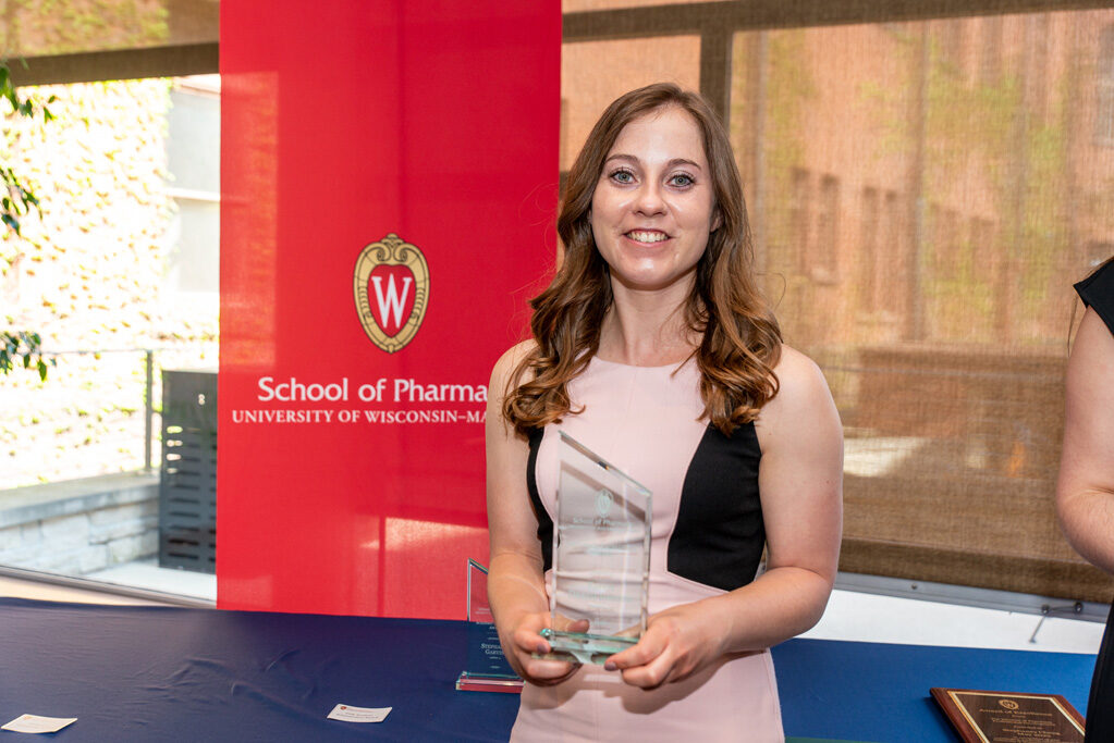 UWPhrmAward_2022_073 UW Pharm Award recipient holding their award
