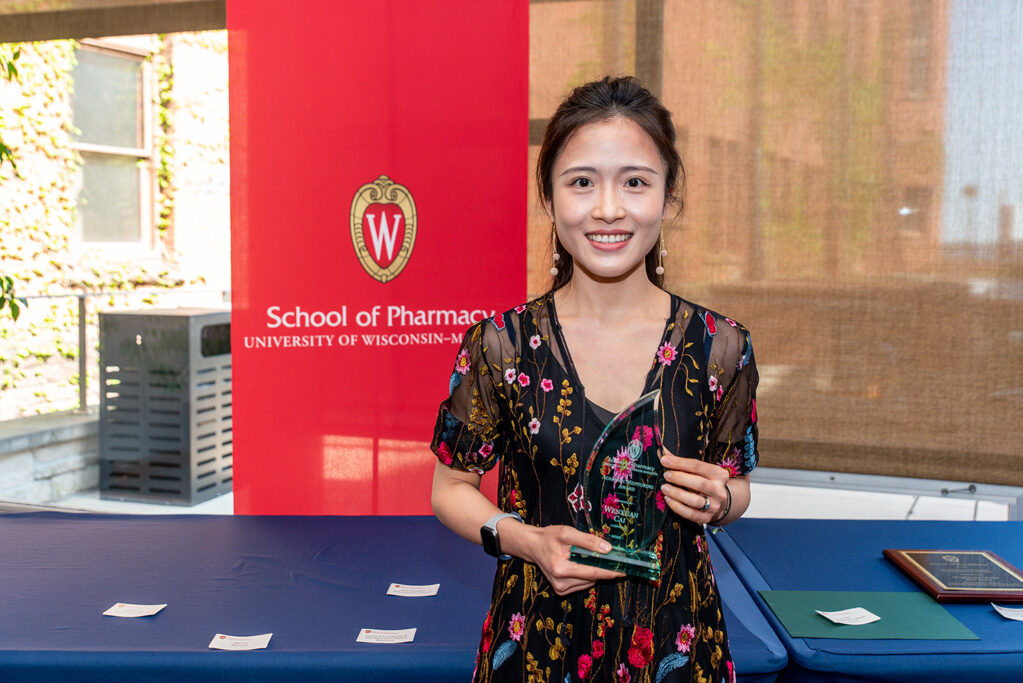 UWPhrmAward_2022_079 UW Pharm Award recipient holding their award