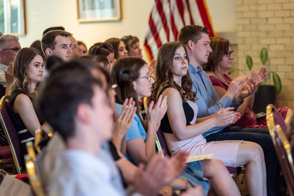 UWPhrmAward_2022_111 Graduate students clapping in their seats