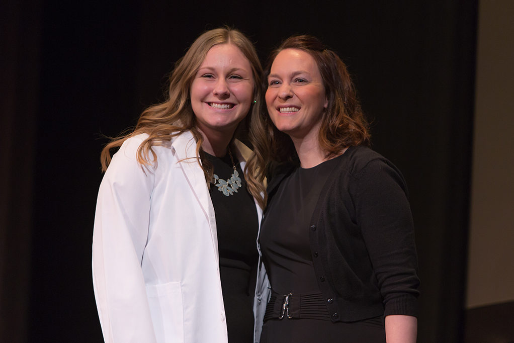 phar041419_032 Students dress with the white coat to symbolize the achievement they have at the School.