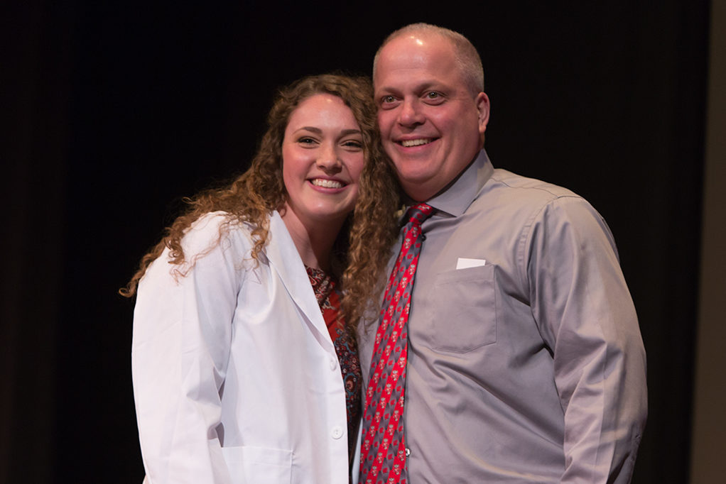 phar041419_036 Students dress with the white coat to symbolize the achievement they have at the School.