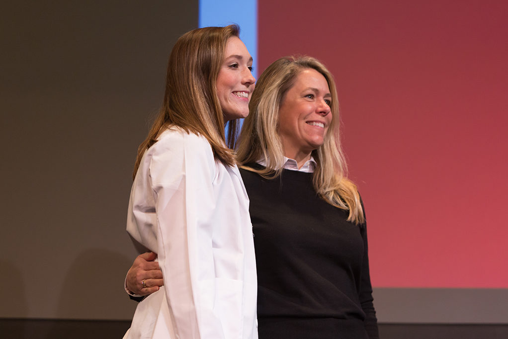 phar041419_072 Students dress with the white coat to symbolize the achievement they have at the School.