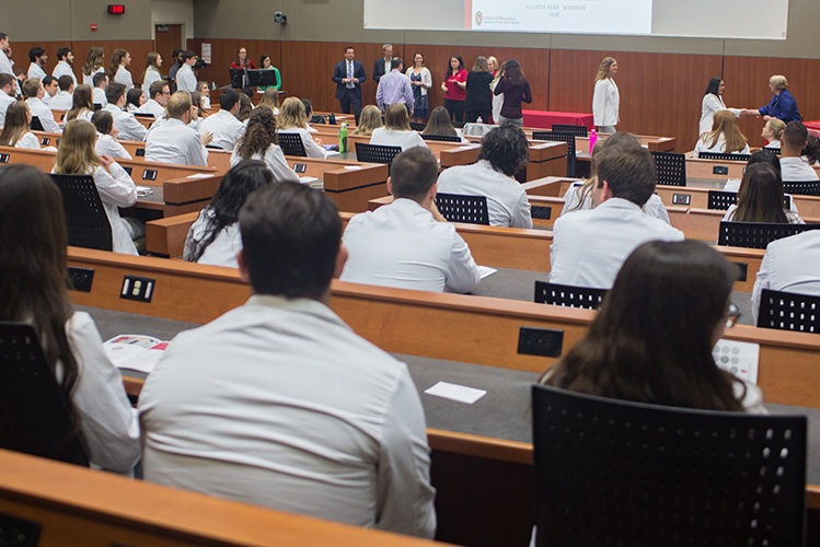 phar050219_031 Students and school faculty conducting the pinning ceremony