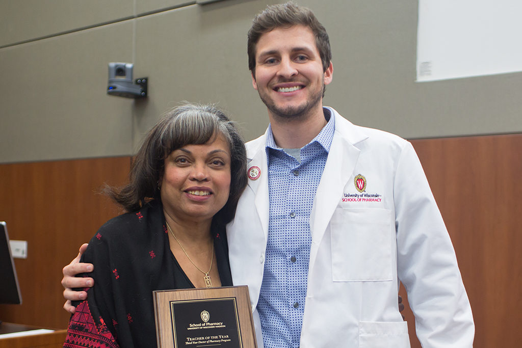phar050219_054 Dr. Eva Vivian with her student.