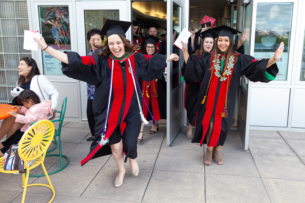phar051019_139 Students celebrate their graduation day and running out the doors