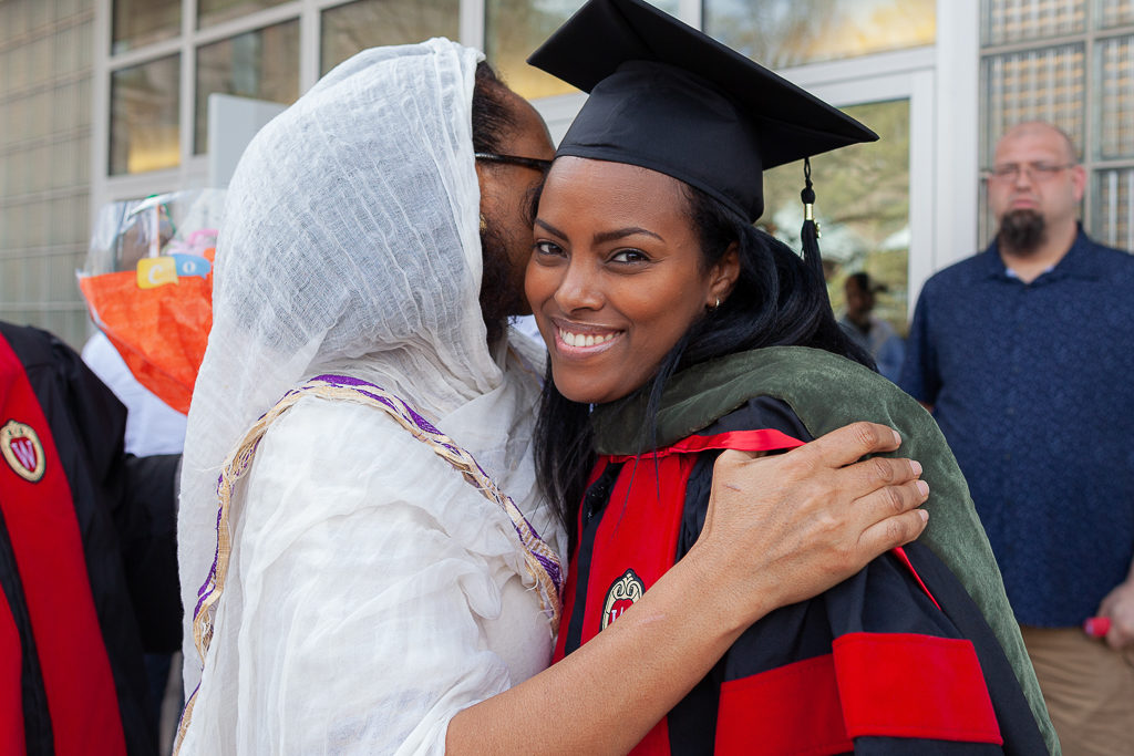phar051019_141 Friends and students celebrate the sweet moment.