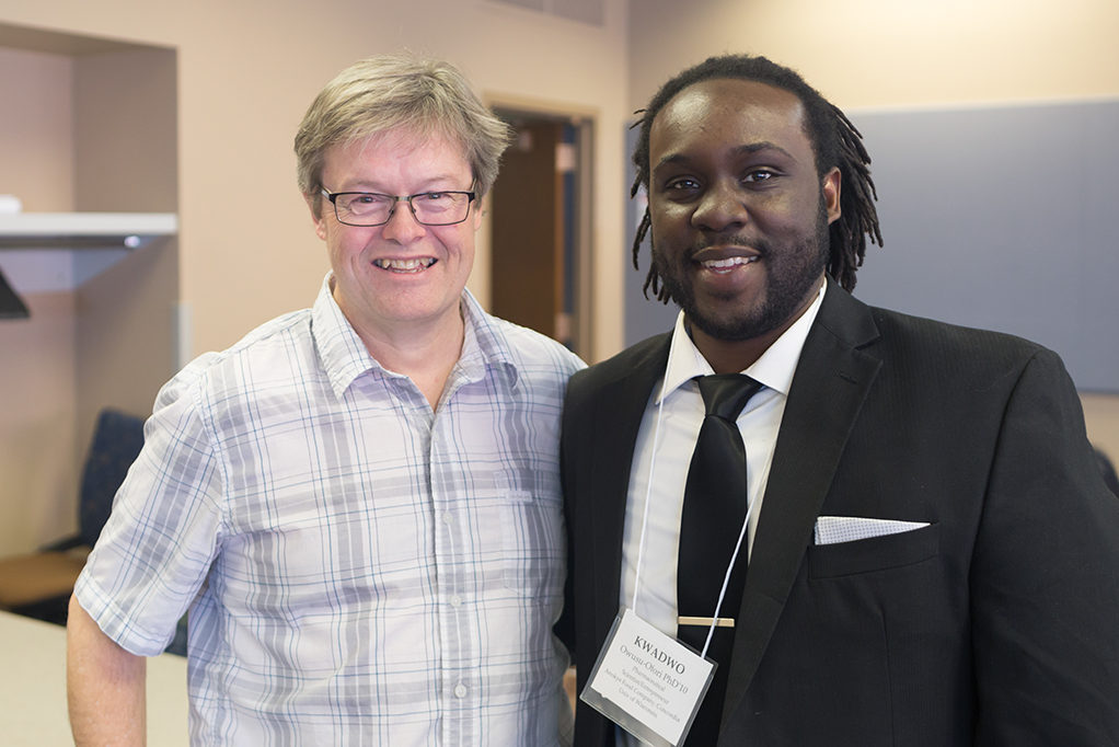 phar051818_049 Chuck Lauhon standing with Kwadwo Owusu-Ofori.