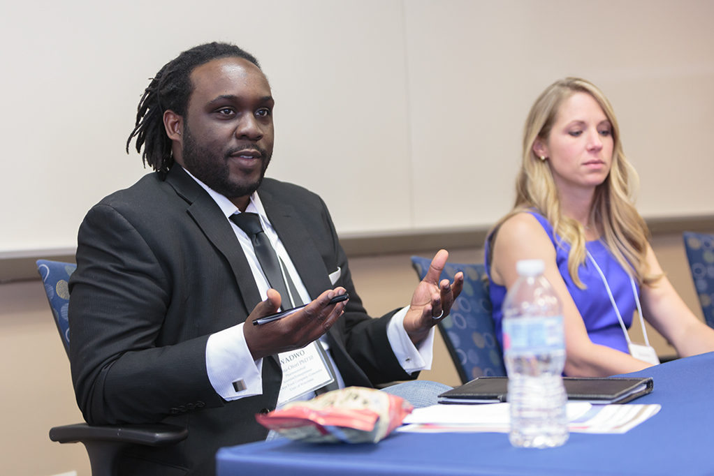 phar051818_065 Kwadwo Owusu-Ofori and Jeanine Burmania sitting on speaking panel