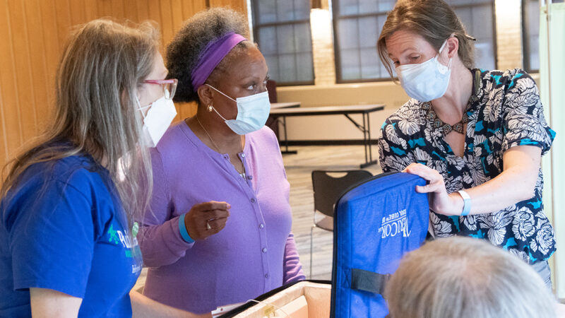 AAHN Outreach and Vaccination Clinic with Eva Vivian, PharmD, MS, PhD Professor Eva Vivian working with other volunteers in vaccination clinic