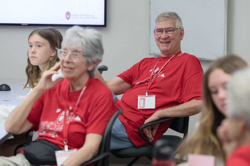 SoP Grandparents University 2023 Attendees smile at the presentations