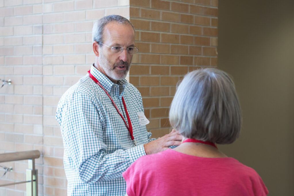 SoP Grandparents University 2023 Dave Mott speaks with an attendee