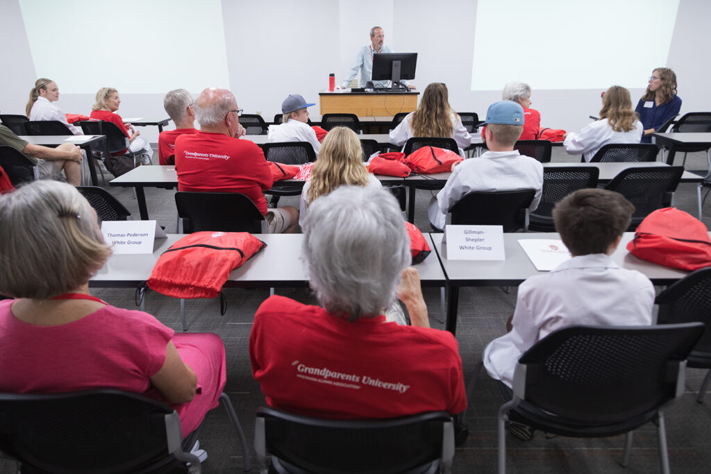 SoP Grandparents University 2023 Dave Mott speaks in front of a room full of attendees