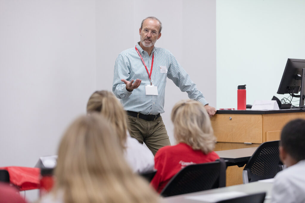SoP Grandparents University 2023 Dave Mott speaks in front of a room full of attendees