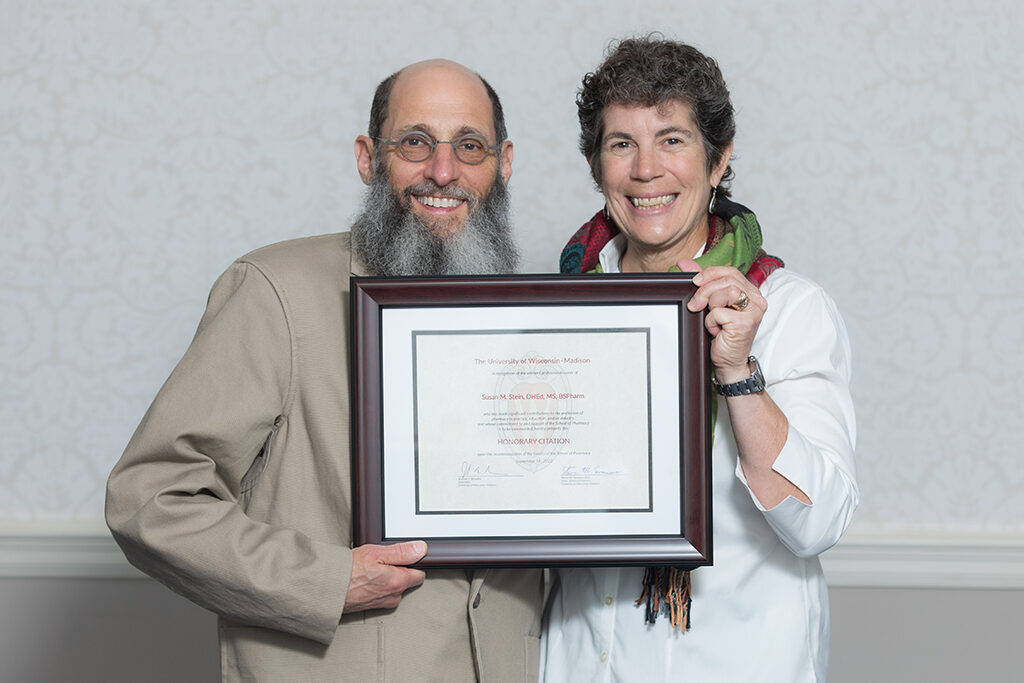 UW School of Pharmacy 2022 Citations of Merit Dinner & Awards Susan and Dan Stein with Susan's Citation award.