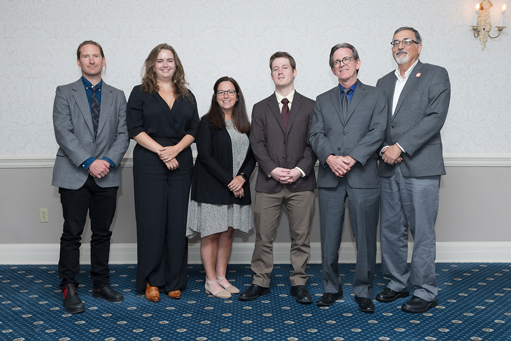 UW School of Pharmacy 2022 Citations of Merit Dinner & Awards Greg Higby, Beth Fisher, John Swann and his son, and Lucas Richert.