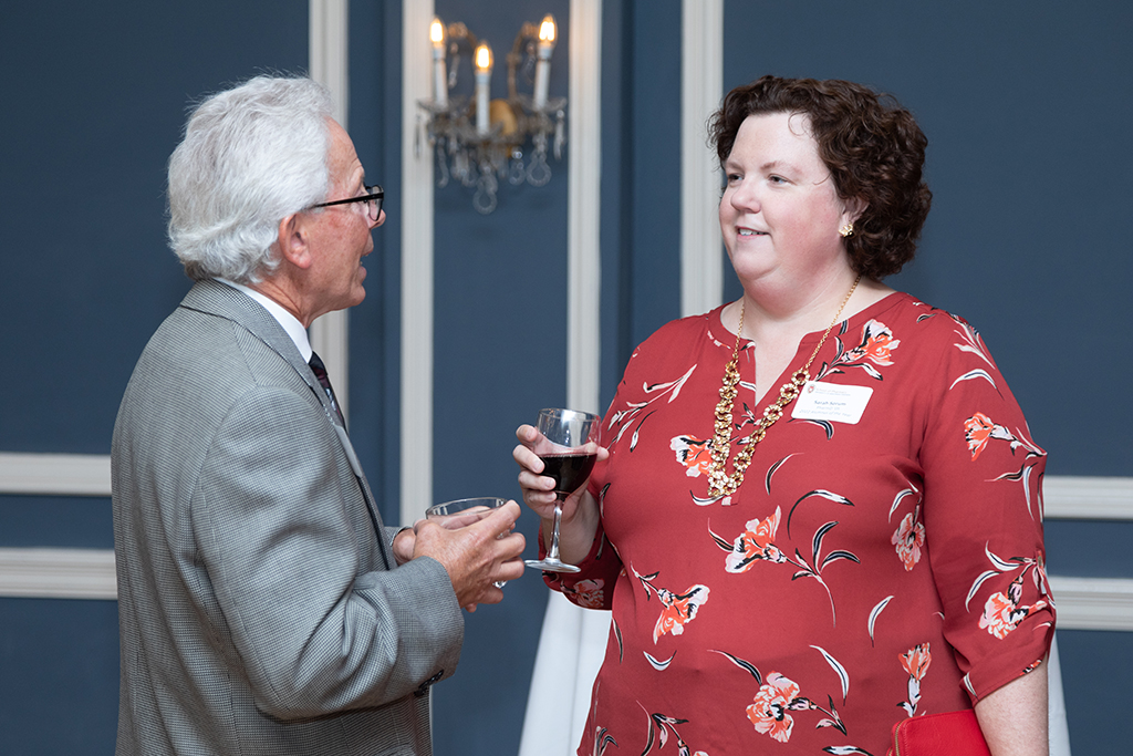 UW School of Pharmacy 2022 Citations of Merit Dinner & Awards Bob Breslow speaking with Sarah Sorum.