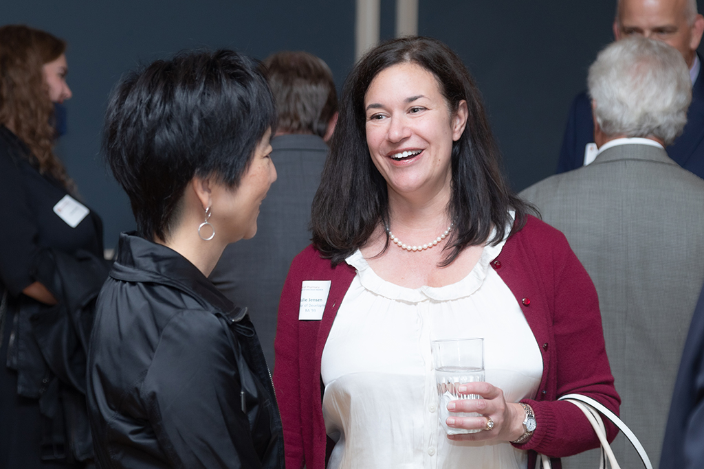 UW School of Pharmacy 2022 Citations of Merit Dinner & Awards Julie Jensen and Michelle Chui converse.