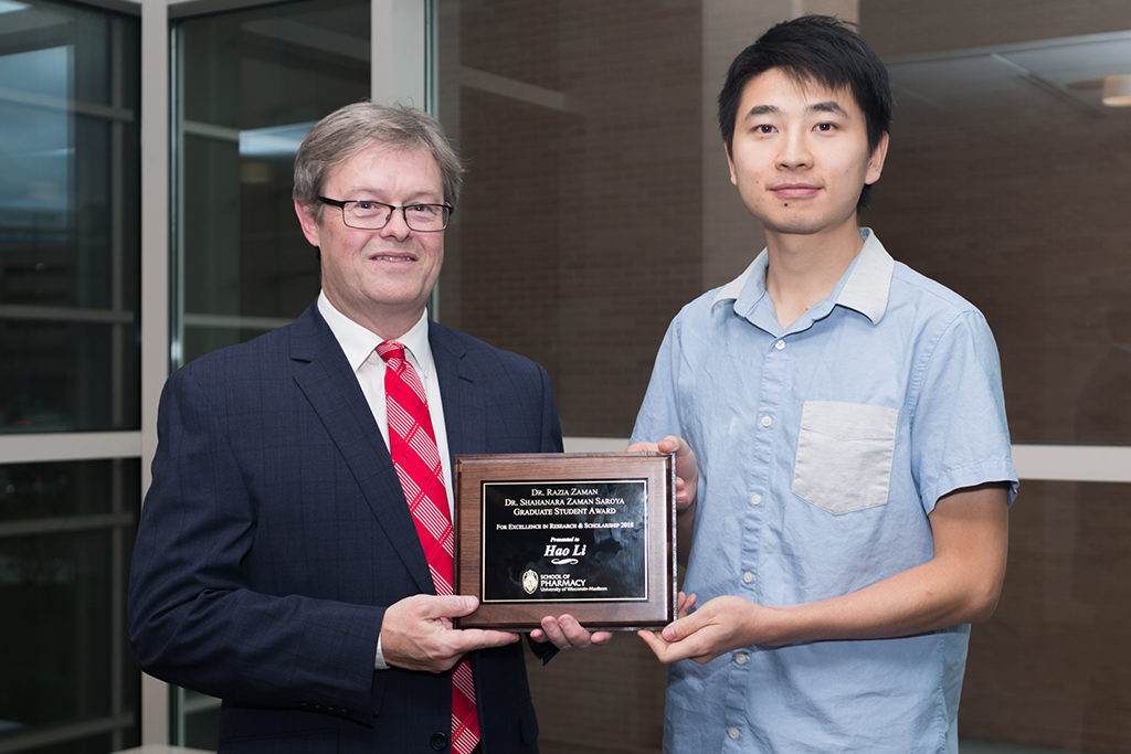 phar092118_003 Chuck Lauhon with graduate student award winner