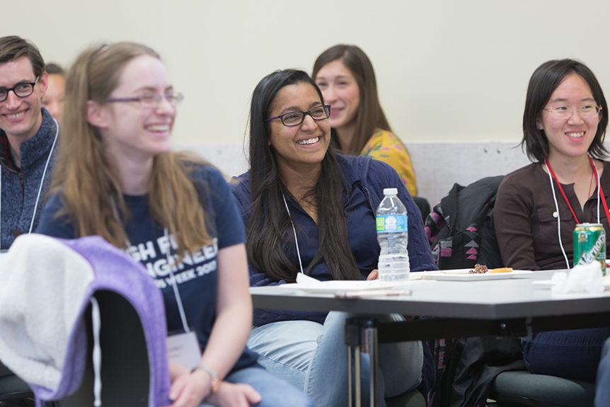 phar092118_010 Students smiling at tables