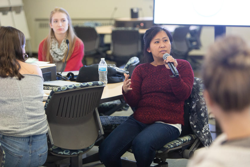 phar092919_025 PharmD and nursing students creating a root cause analysis for a transitions of care simulation.