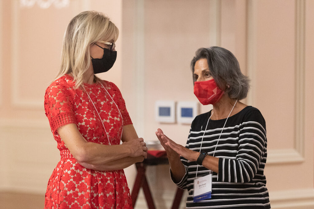 School of Pharmacy Citations of Merit Awards 2021 Nita Pandit speaking with Beth Martin