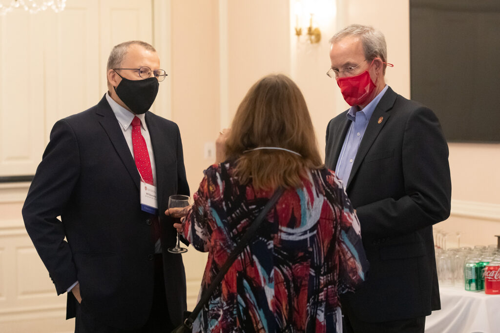 School of Pharmacy Citations of Merit Awards 2021 Dave Mott and other event coordinators speaking together