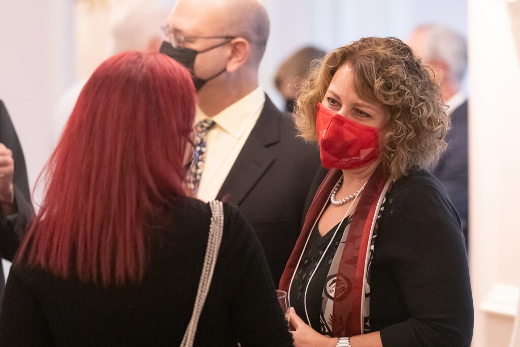 School of Pharmacy Citations of Merit Awards 2021 Event attendees talking together