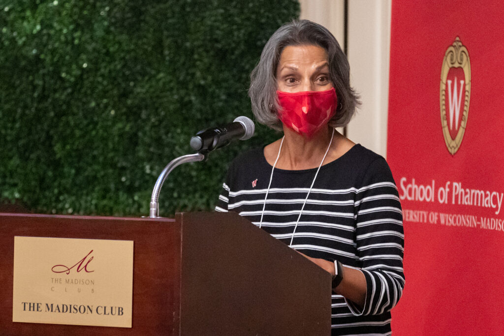 Nita Pandit speaking at podium